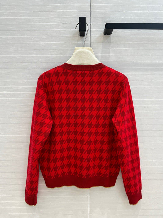 Gold-trimmed houndstooth knitted cardigan