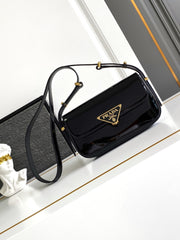 Black Patent Leather Baguette Bag with Gold Accents