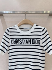 Monochrome Stripe Knit Top with Bold Text Embellishment