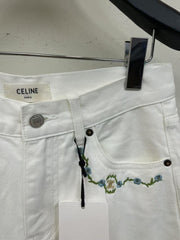 White denim shorts with embroidered letters