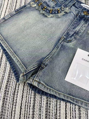 Heavy rivet tassel embroidered denim shorts