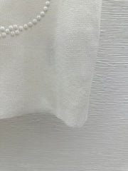 Solid color round neck letter embossed knitted vest