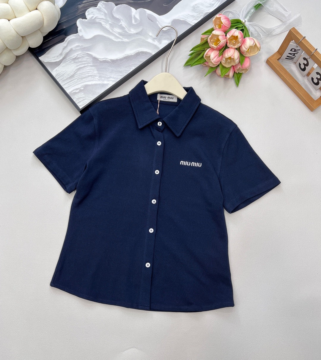Single-breasted polo shirt with micro-logo embroidery and cotton piqué
