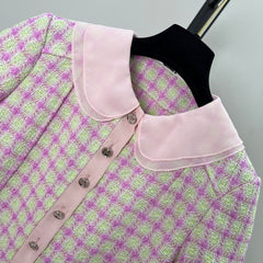 Short-sleeved tweed top with a baby doll collar