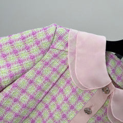 Short-sleeved tweed top with a baby doll collar