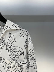 Bow print v-neck long sleeve shirt