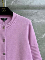 Cashmere cardigan with school bag button